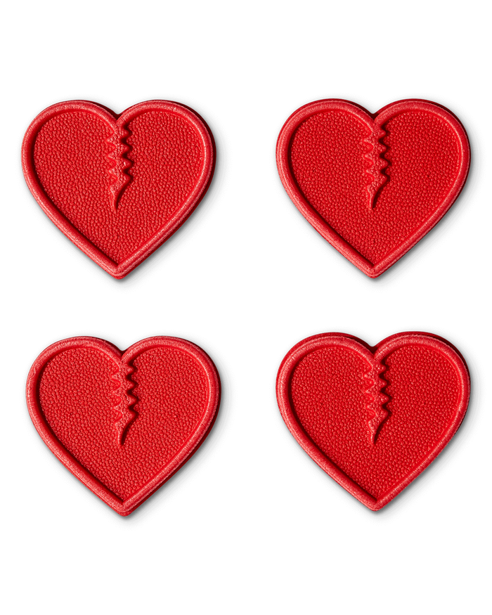 4 pack of all red mini heart shaped snowboard stomp pads by Crab Grab