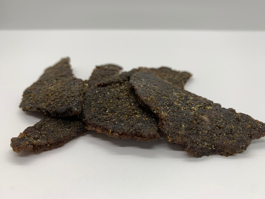 Close up photo of delicious Carnal Jerky.  
